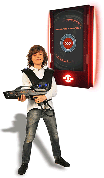 Boy with laser tag equipment standing in front of a Delta Strike Laser Tag Video Base Station